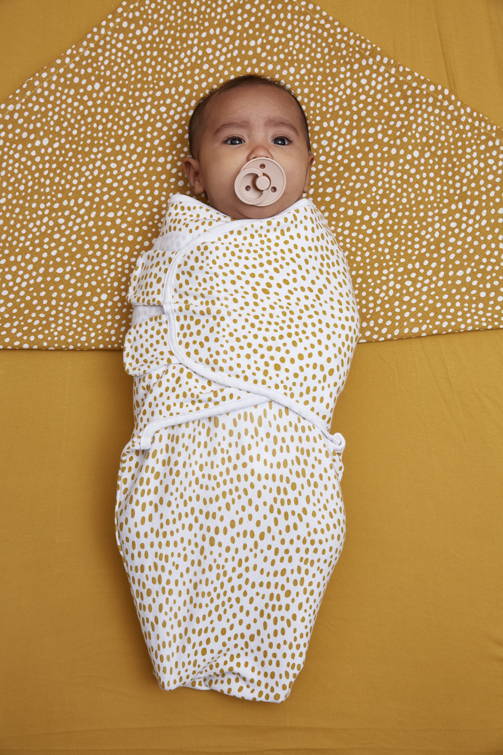 SwaddleMeyco inbakerdoek Cheetah - honey gold - 0-3 maanden
