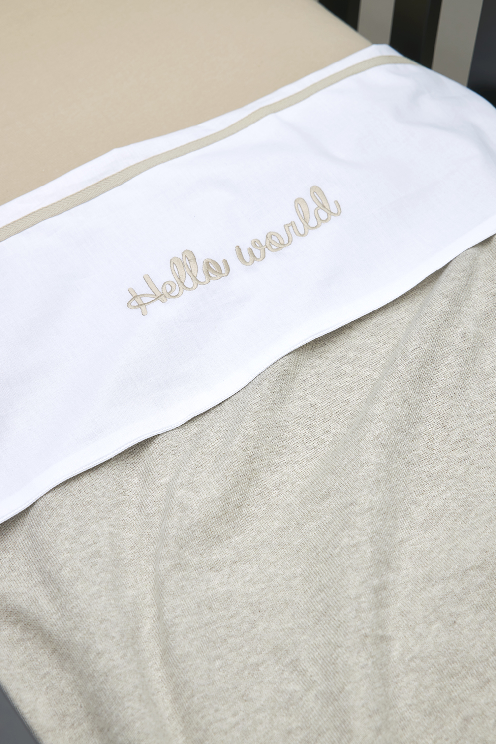 Cot bed sheet Hello World - sand - 100x150cm